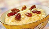 Каша пшенная с изюмом и творогом