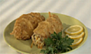 Кальмары, фаршированные пшеничной крупой