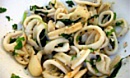 Теплый салат из кальмаров с рисом